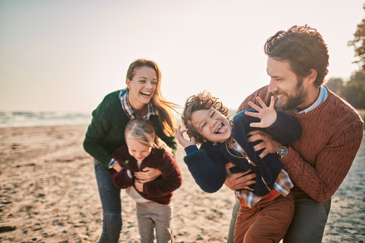 Family having fun at the beach